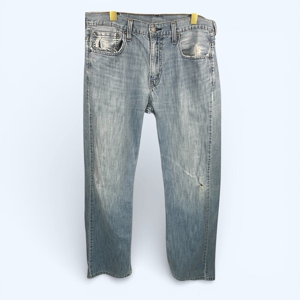 Levi's 569 Men's Jeans Tag Size 32x34 Actual Size 33x32 Light Wash Broken In